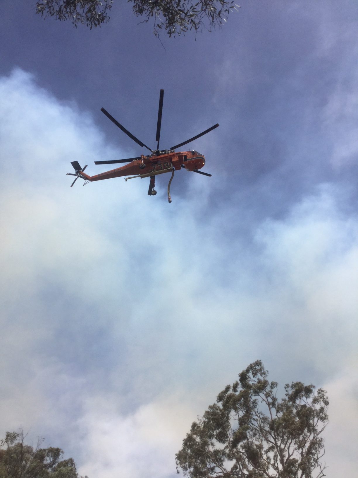 Good Good Fire, skycrane helicopter in flight